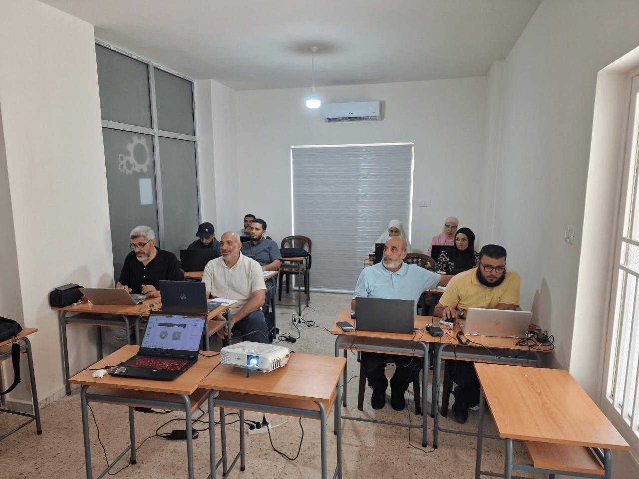 فريق عمل أكاديمية AMAM